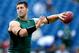 FOXBORO, MA - OCTOBER 21: Tim Tebow #15 of the New York Jets completes drills before a game against the New England Patriots at Gillette Stadium on October 21, 2012 in Foxboro, Massachusetts. (Photo by Jim Rogash/Getty Images)