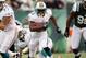 EAST RUTHERFORD, NJ - OCTOBER 28: Running back Reggie Bush #22 of the Miami Dolphins runs the ball against the New York Jets at MetLife Stadium on October 28, 2012 in East Rutherford, New Jersey. (Photo by Alex Trautwig/Getty Images)