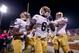 Oct. 27, 2012; Norman, OK, USA; Notre Dame Fighting Irish running back Theo Riddick (6) celebrates with quarterback Everett Golson (5) and center Braxston Cave (52) after a touchdown in the fourth quarter against the Oklahoma Sooners at Oklahoma Memorial Stadium. Notre Dame won 30-13. Mandatory Credit: Matt Cashore-US PRESSWIRE