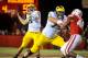 LINCOLN, NE - OCTOBER 27: Quarterback Russell Bellomy #8 of the Michigan Wolverines looks down field over the Nebraska Cornhuskers defense during their game at Memorial Stadium on October 27, 2012 in Lincoln, Nebraska. Bellomy entered the game after quarterback Denard Robinson #16 of the Michigan Wolverines left the game with an injury. Nebraska defeated Michigan 23-9. (Photo by Eric Francis/Getty Images)