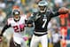 PHILADELPHIA, PA - OCTOBER 28: Quarterback Michael Vick #7 of the Philadelphia Eagles looks to pass on the run as Thomas DeCoud #28 of the Atlanta Falcons chases during a game at Lincoln Financial Field on October 28, 2012 in Philadelphia, Pennsylvania. (Photo by Rich Schultz /Getty Images)
