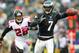 PHILADELPHIA, PA - OCTOBER 28: Quarterback Michael Vick #7 of the Philadelphia Eagles looks to pass on the run as Thomas DeCoud #28 of the Atlanta Falcons chases during a game at Lincoln Financial Field on October 28, 2012 in Philadelphia, Pennsylvania. (Photo by Rich Schultz /Getty Images)