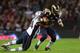 LONDON, ENGLAND - OCTOBER 28: Dont'a Hightower #54 of the New England Patriots
tackles Steven Jackson #39 of the St. Louis Rams
during the NFL International Series match between the New England Patriots and the St. Louis Rams at Wembley Stadium on October 28, 2012 in London, England. (Photo by Scott Heavey/Getty Images)