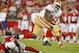 GLENDALE, AZ - OCTOBER 29: Running back Frank Gore #21 of the San Francisco 49ers leaps over William Gay #22 of the Arizona Cardinals on a frist down run during the first quarter of an NFL game at University of Phoenix Stadium on October 29, 2012 in Glendale, Arizona. (Photo by Ralph Freso/Getty Images)