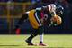 GREEN BAY, WI - OCTOBER 28: James Jones #89 of the Green Bay Packers is tackled by Dawan Landry #26 of the Jacksonville Jaguars at Lambeau Field on October 28, 2012 in Green Bay, Wisconsin. (Photo by Dilip Vishwanat/Getty Images)