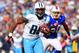 Oct 21, 2012; Orchard Park, NY, USA; Tennessee Titans tight end Jared Cook (89) is chased by Buffalo Bills outside linebacker Nick Barnett (50) during the second quarter at Ralph Wilson Stadium. Mandatory Credit: Kevin Hoffman-US PRESSWIRE