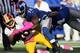 EAST RUTHERFORD, NJ - OCTOBER 21: Defensive end Osi Umenyiora #72 of the New York Giants sacks quarterback Robert Griffin III #10 of the Washington Redskins during their game at MetLife Stadium on October 21, 2012 in East Rutherford, New Jersey. (Photo by Alex Trautwig/Getty Images)