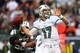 EAST RUTHERFORD, NJ - OCTOBER 28: Ryan Tannehill #17 of the Miami Dolphins drops back to pass as Bryan Thomas #58 of the New York Jets defends on October 28, 2012 at MetLife Stadium in East Rutherford, New Jersey. (Photo by Elsa/Getty Images)