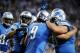 Oct 28, 2012; Detroit, MI, USA; Detroit Lions quarterback Matthew Stafford (9) celebrates a touchdown with teammates during the fourth quarter against the Seattle Seahawks at Ford Field. Detroit won 28-24. Mandatory Credit: Tim Fuller-US PRESSWIRE