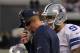 Oct 28, 2012; Arlington, TX, USA; Dallas Cowboys quarterback Tony Romo (9) talks with head coach Jason Garrett during the fourth quarter against the New York Giants at Cowboys Stadium. Mandatory Credit: Matthew Emmons-US PRESSWIRE