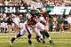 EAST RUTHERFORD, NJ - NOVEMBER 27: Dustin Keller #81 of the New York Jets scores a touchdown as Justin Rogers #26 of the Buffalo Bills is late with the tackle during their game on November 27, 2011 at MetLife Stadium in East Rutherford, New Jersey. (Photo by Al Bello/Getty Images)