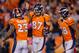 DENVER, CO - OCTOBER 28: Wide receiver Eric Decker #87 of the Denver Broncos celebrates with teammates running back Willis McGahee #23 and wide receiver Demaryius Thomas #88 after scoring a touchdown during the fourth quarter against the New Orleans Saints at Sports Authority Field Field at Mile High on October 28, 2012 in Denver, Colorado. The Broncos defeated the Saints 34-14. (Photo by Justin Edmonds/Getty Images)