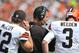 Sep 9, 2012; Cleveland, OH, USA; Cleveland Browns head coach Pat Shurmur talks to quarterback Colt McCoy and quarterback Brandon Weeden (3) during a game against the Philadelphia Eagles at Cleveland Browns Stadium. Philadelphia won 17-16. Mandatory Credit: David Richard-US PRESSWIRE