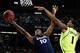 ATLANTA, GA - MARCH 23: Mark Lyons #10 of the Xavier Musketeers shoots past Perry Jones III #1 of the Baylor Bears during the 2012 NCAA Men's Basketball South Regional Semifinal game at the Georgia Dome on March 23, 2012 in Atlanta, Georgia. (Photo by Kevin C. Cox/Getty Images)