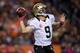 DENVER, CO - OCTOBER 28: Quarterback Drew Brees #9 of the New Orleans Saints throws a pass during the first quarter against the Denver Broncos at Sports Authority Field Field at Mile High on October 28, 2012 in Denver, Colorado. (Photo by Justin Edmonds/Getty Images)