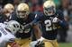 SOUTH BEND, IN - OCTOBER 20: Cierre Wood #20 of the Notre Dame Fighting Irish breaks away from Daniel Sorensen #9 of the BYU Courgars at Notre Dame Stadium on October 20, 2012 in South Bend, Indiana. Notre Dame defeated BYU 17-14. (Photo by Jonathan Daniel/Getty Images)