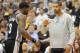 SALT LAKE CITY, UT - MAY 5: Tim Duncan #21 of the San Antonio Spurs greets Stephen Jackson #3 of the San Antonio Spurs as he comes to the bench during the fourth quarter of Game Three of the Western Conference Quarterfinals in the 2012 NBA Playoffs at EnergySolutions Arena on May 05, 2012 in Salt Lake City, Utah. The Spurs won the game 102-90. NOTE TO USER: User expressly acknowledges and agrees that, by downloading and or using this photograph, User is consenting to the terms and conditions of the Getty Images License Agreement. (Photo by Steve Dykes/Getty Images)