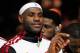 MIAMI, FL - OCTOBER 30: LeBron James #6 of the Miami Heat looks at his 2012 NBA Championship ring following a ceremony prior to the game against the Boston Celtics at American Airlines Arena on October 30, 2012 in Miami, Florida. NOTE TO USER: User expressly acknowledges and agrees that, by downloading and/or using this Photograph, user is consenting to the terms and conditions of the Getty Images License Agreement. (Photo by Chris Trotman/Getty Images)