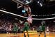 MIAMI, FL - OCTOBER 30: Dwyane Wade #3 of the Miami Heat dunks the ball over Courtney Lee #11 of the Boston Celtics at American Airlines Arena on October 30, 2012 in Miami, Florida. NOTE TO USER: User expressly acknowledges and agrees that, by downloading and/or using this Photograph, user is consenting to the terms and conditions of the Getty Images License Agreement. (Photo by Chris Trotman/Getty Images)