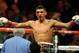 December 3, 2011; Anaheim, CA, USA; Abner Mares celebrates after winning a judges decision against Joseph Agbeko to keep his IBF bantamweight title at the Honda Center. Mandatory Credit: Christopher Hanewinckel-US PRESSWIRE