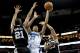 October 31, 2012; New Orleans, LA, USA; New Orleans Hornets power forward Anthony Davis (23) shoots over San Antonio Spurs power forward Tim Duncan (21) and power forward Boris Diaw (33) during the first quarter of a game at the New Orleans Arena. Mandatory Credit: Derick E. Hingle-US PRESSWIRE