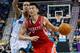 NEW ORLEANS, LA - OCTOBER 24: Jeremy Lin #7 of the Houston Rockets drives the ball around Brian Roberts #22 of the New Orleans Hornets at New Orleans Arena on October 24, 2012 in New Orleans, Louisiana. NOTE TO USER: User expressly acknowledges and agrees that, by downloading and or using this photograph, User is consenting to the terms and conditions of the Getty Images License Agreement. (Photo by Chris Graythen/Getty Images)