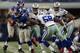 ARLINGTON, TX - OCTOBER 28: Ahmad Bradshaw #44 of the New York Giants runs the ball past Orie Lemon #58 of the Dallas Cowboys at Cowboys Stadium on October 28, 2012 in Arlington, Texas. (Photo by Ronald Martinez/Getty Images)
