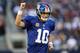 ARLINGTON, TX - OCTOBER 28: Eli Manning #10 of the New York Giants celebrates a touchdown by Henry Hynoski #45 against the Dallas Cowboys at Cowboys Stadium on October 28, 2012 in Arlington, Texas. (Photo by Ronald Martinez/Getty Images)