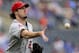 KANSAS CITY, MO - SEPTEMBER 16: Starting pitcher Dan Haren #24 of the Los Angeles Angels of Anaheim tosses the ball to first to get Billy Butler of the Kansas City Royals out in the sixth inning at Kauffman Stadium on September 16, 2012 in Kansas City, Missouri. The Angels won 4-3. (Photo by Ed Zurga/Getty Images)