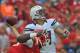 KANSAS CITY, MO - SEPTEMBER 30: Quarterback Philip Rivers #17 of the San Diego Chargers throws a pass down field against the Kansas City Chiefs during the first quarter on September 30, 2012 at Arrowhead Stadium in Kansas City, Missouri. (Photo by Peter Aiken/Getty Images)