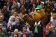 TORONTO, CANADA - OCTOBER 31: A fan dressed up as Yogi the Bear for Halloween cheers as the Indiana Pacers take the Toronto Raptors on October 31, 2012 at the Air Canada Centre in Toronto, Canada. NOTE TO USER: User expressly acknowledges and agrees that, by downloading and or using this photograph, User is consenting to the terms and conditions of the Getty Images License Agreement. (Photo by David Sandford/Getty
Images)