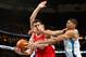 NEW ORLEANS, LA - OCTOBER 24: Carlos Delfino #10 of the Houston Rockets fights for a loose ball with Anthony Davis #23 of the New Orleans Hornets at New Orleans Arena on October 24, 2012 in New Orleans, Louisiana. NOTE TO USER: User expressly acknowledges and agrees that, by downloading and or using this photograph, User is consenting to the terms and conditions of the Getty Images License Agreement. (Photo by Chris Graythen/Getty Images)
