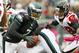 Thomas DeCoud about to wrap up Michael Vick