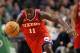Oct 21, 2012; Boston, MA, USA; Philadelphia 76ers point guard Jrue Holiday (11) dribbles the ball against the Boston Celtics during the second half at TD Garden. Mandatory Credit: Mark L. Baer-US PRESSWIRE