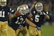 SOUTH BEND, IN - OCTOBER 20: Danny Spond #13 of the Notre Dame Fighting Irish celebrates with teammates including Manti T'eo #5 after intercepting a pass on the next to last play of the game against the BYU Cougars at Notre Dame Stadium on October 20, 2012 in South Bend, Indiana. Notre Dame defeated BYU 17-14. (Photo by Jonathan Daniel/Getty Images)