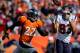 DENVER, CO - SEPTEMBER 23: Wide receiver Kevin Walter #83 of the Houston Texans catches a 52-tars pass on his way to scoring a touchdown as cornerback Tracy Porter #22 of the Denver Broncos trails behind during the second quarter at Sports Authority Field Field at Mile High on September 23, 2012 in Denver, Colorado. (Photo by Justin Edmonds/Getty Images)