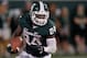 EAST LANSING, MI - AUGUST 31: Le'Veon Bell #24 of the Michigan State Spartans looks for running room during a third quarter run while playing the Boise State Broncos at Spartan Stadium on August, 2010 in East Lansing, Michigan. (Photo by Gregory Shamus/Getty Images)