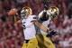 Oct. 27, 2012; Norman, OK, USA; Notre Dame Fighting Irish linebacker Manti Te'o (5) celebrates with defensive end Kapron Lewis-Moore (89) after a fourth quarter interception against the Oklahoma Sooners at Oklahoma Memorial Stadium. Notre Dame won 30-13. Mandatory Credit: Matt Cashore-US PRESSWIRE