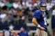 ARLINGTON, TX - OCTOBER 28: Eli Manning #10 of the New York Giants reacts to a play against the Dallas Cowboys at Cowboys Stadium on October 28, 2012 in Arlington, Texas. The New York Giants beat the Dallas Cowboys 29-26. (Photo by Tom Pennington/Getty Images)