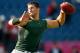 FOXBORO, MA - OCTOBER 21: Tim Tebow #15 of the New York Jets completes drills before a game against the New England Patriots at Gillette Stadium on October 21, 2012 in Foxboro, Massachusetts. (Photo by Jim Rogash/Getty Images)