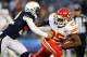 November 1, 2012; San Diego, CA, USA; Kansas City Chiefs running back Jamaal Charles (25) is tackled by San Diego Chargers safety Eric Weddle (32) during the first quarter at Qualcomm Stadium. Mandatory Credit: Christopher Hanewinckel-US PRESSWIRE
