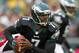 PHILADELPHIA, PA - OCTOBER 28: Quarterback Michael Vick #7 of the Philadelphia Eagles looks to run against the Atlanta Falcons during a game at Lincoln Financial Field on October 28, 2012 in Philadelphia, Pennsylvania. (Photo by Rich Schultz /Getty Images)