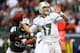 EAST RUTHERFORD, NJ - OCTOBER 28: Ryan Tannehill #17 of the Miami Dolphins drops back to pass as Bryan Thomas #58 of the New York Jets defends on October 28, 2012 at MetLife Stadium in East Rutherford, New Jersey. (Photo by Elsa/Getty Images)