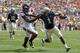 PITTSBURGH, PA - SEPTEMBER 15: Ray Graham #1 of the Pittsburgh Panthers stiff arms Antone Exum #1 of the Virginia Tech Hokies during the game on September 15, 2012 at Heinz Field in Pittsburgh, Pennsylvania. (Photo by Justin K. Aller/Getty Images)