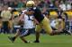 SOUTH BEND, IN - OCTOBER 20: Stephon Tuitt #7 of the Notre Dame Fighting Irish sacks Riley Nelson #13 of the BYU Cougars at Notre Dame Stadium on October 20, 2012 in South Bend, Indiana. Notre Dame defeated BYU 17-14. (Photo by Jonathan Daniel/Getty Images)