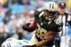 CHARLOTTE, NC - SEPTEMBER 16: Mark Ingram #28 of the New Orleans Saints breaks away from the Carolina Panthers defense during play at Bank of America Stadium on September 16, 2012 in Charlotte, North Carolina. (Photo by Grant Halverson/Getty Images)
