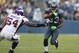 SEATTLE - AUGUST 20: Running back Leon Washington #33 of the Seattle Seahawks rushes against Jasper Brinkley #54 of the Minnesota Vikings at CenturyLink Field on August 20, 2011 in Seattle, Washington. The Vikings won 20-7. (Photo by Otto Greule Jr/Getty Images)
