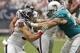 HOUSTON,TX - SEPTEMBER 09: Connor Barwin #98 of the Houston Texans takes on Jake Long #77 of the Miami Dolphins during the season opener at Reliant Stadium on September 9, 2012 in Houston, Texas. (Photo by Bob Levey/Getty Images)