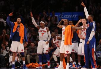 The New York Knicks celebrated a big win over the Miami Heat in their home opener.