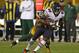 GREEN BAY, WI - SEPTEMBER 13: Earl Bennett #80 of the Chicago Bears tries to break away from Tramon Williams #38 of the Green Bay Packers at Lambeau Field on September 13, 2012 in Green Bay, Wisconsin. The Packers defeated the Bears 23-10. (Photo by Jonathan Daniel/Getty Images)